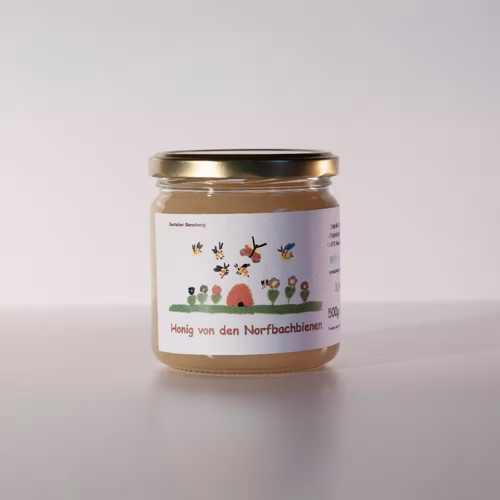 Symbolbild für das Beschriebene Produkt: ein Honigglas gefüllt mit gelblich weißem opaguem Honig.